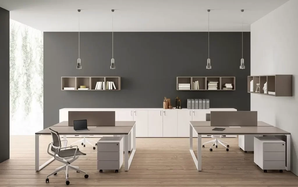 A office furniture Saudi Arabia space with two desks, a filing cabinet, and shelves.