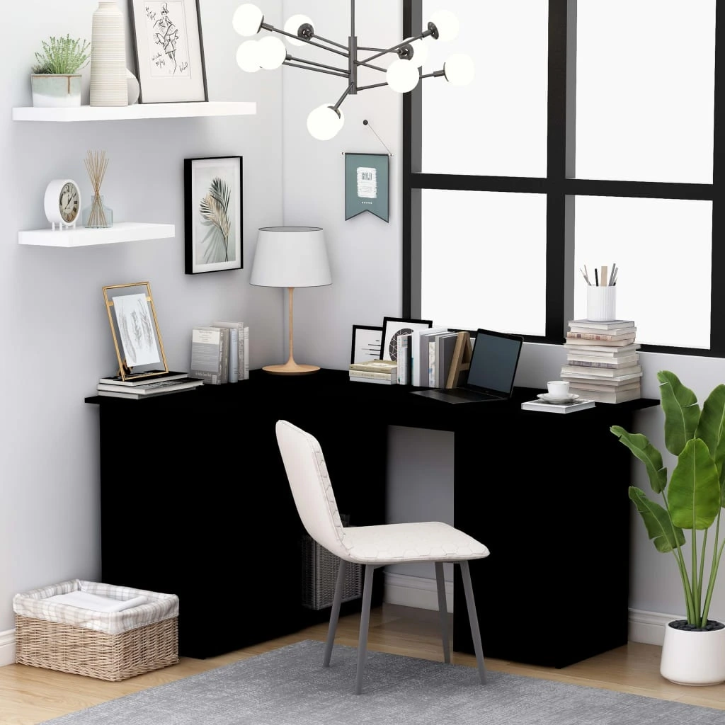 A chair with a modern black corner desk in a cozy home office furniture setup.