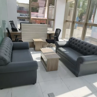 Grey Sofas and Coffee Table in a Modern Office Waiting Area