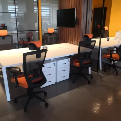 Orange ergonomic chairs in a modern office