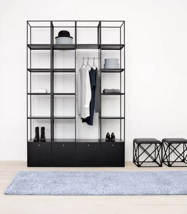 Black metal wardrobe with shelves, hanging bar, drawers, and shoe storage