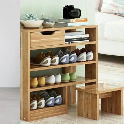 Modern shoe rack with multiple tiers for organized footwear storage, accompanied by additional storage solution