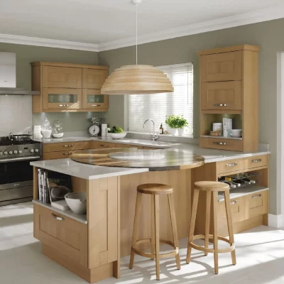 Modern Kitchen with Light Wood Cabinets, a Large Island, and Bar Stools